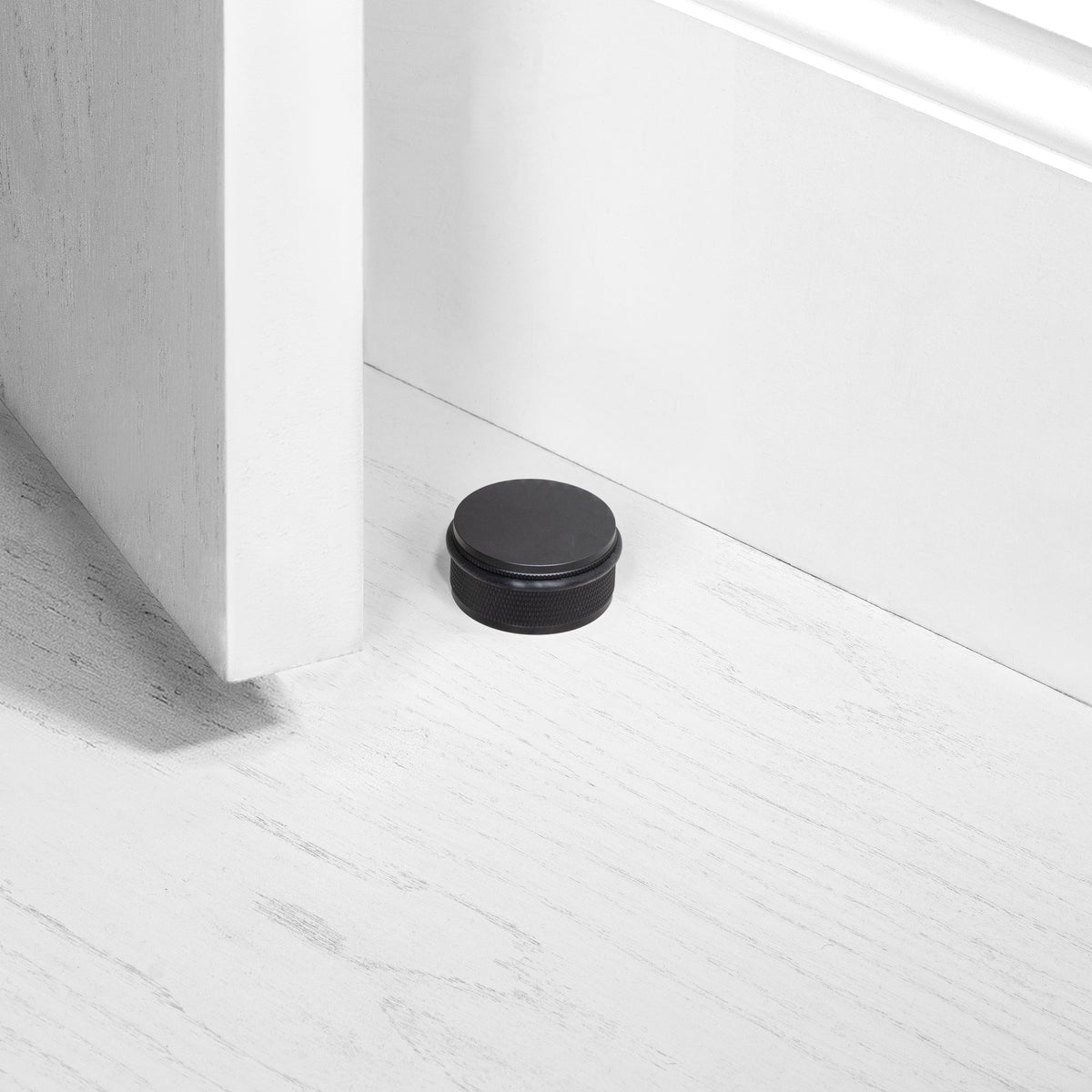 BUSTER + PUNCH® - DOOR STOP / FLOOR - BLACK